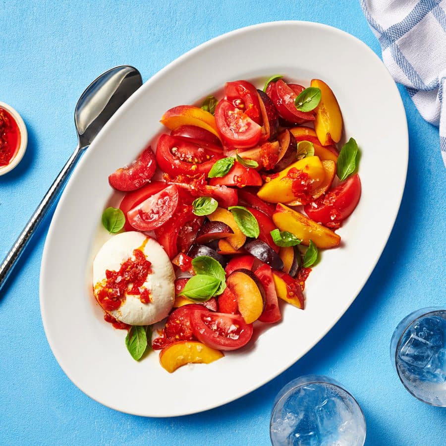 Image of tomatoes and stone fruit