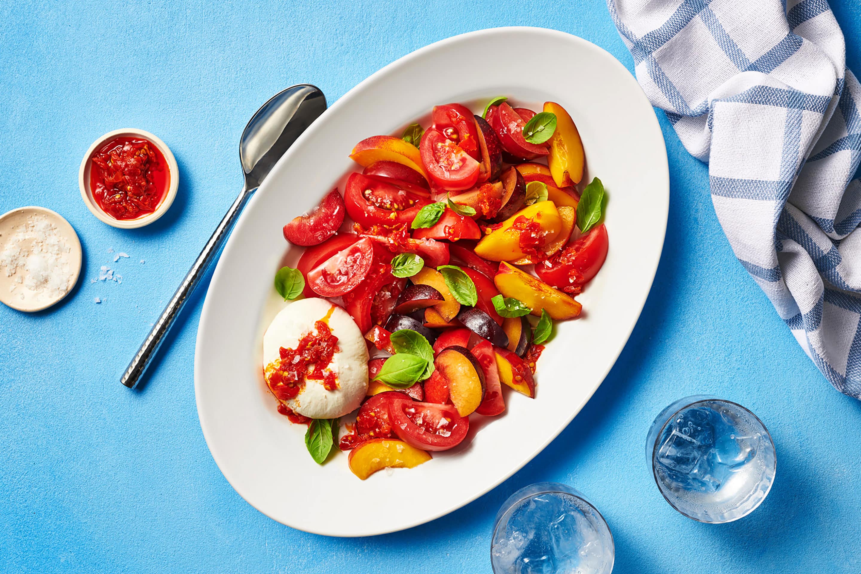 Image of tomatoes and stone fruit